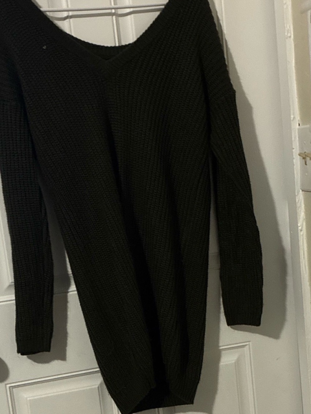 Muse Woman’s Black V-Neck Knit Sweater